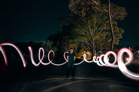man standing in front of the trees thumbnail