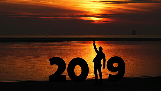 silhouette photography of person on beach thumbnail