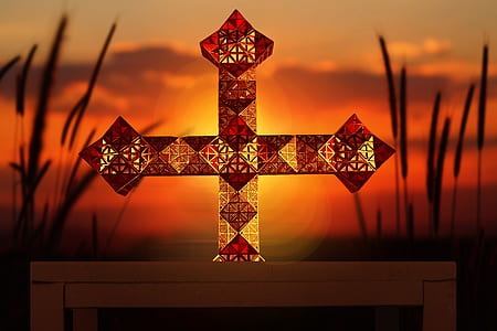 glass cross during dawn thumbnail