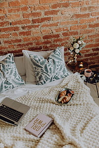 A lovely woman's bedroom with a beautiful bouquet of flowers thumbnail