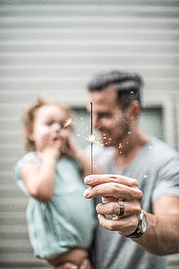 man holding sparklers thumbnail