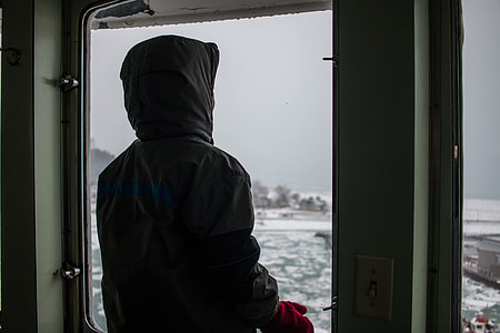 person wearing hooded jacket thumbnail