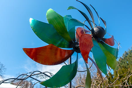 green and red metal decor during daytime thumbnail