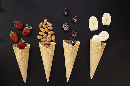 four ice cream cones and fruits thumbnail