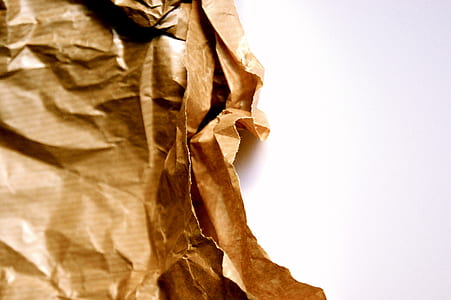 brown paper wrapper on top of white surface thumbnail