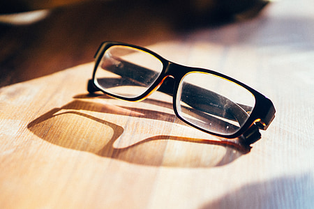 eyeglasses with black frames thumbnail