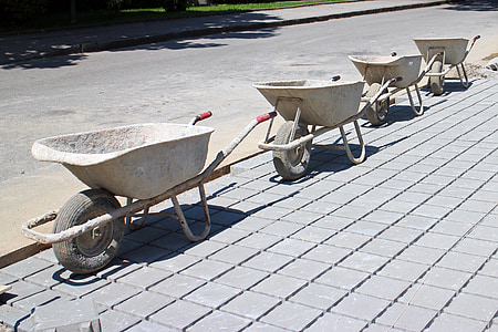 four white wheelbarrows thumbnail