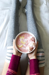 photo of person holding bowl with cooked food thumbnail