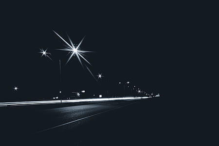 lighted road during nigth thumbnail