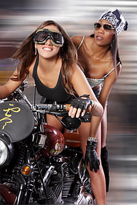 two women riding a motorcycle thumbnail