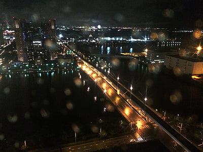 aerial photography of building and bridge during nighttime thumbnail