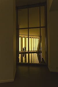 brown wooden 6-lite window inside room thumbnail