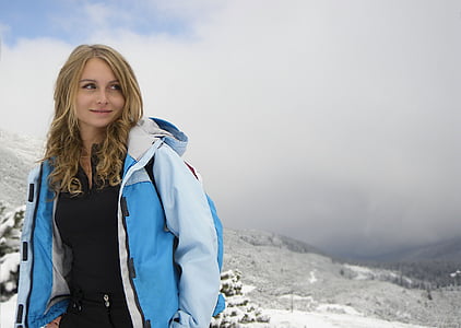 woman wearing blue and white zip-up jacket thumbnail