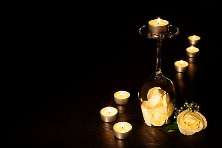brass-colored candle stand and candles thumbnail