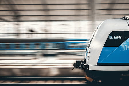 High speed train in motion at the railway station at summer thumbnail