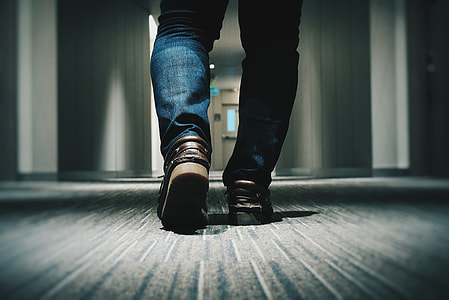 person walking on house pathway thumbnail