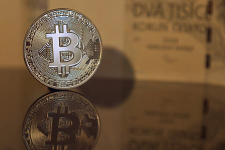 round silver-colored Bitcoin thumbnail