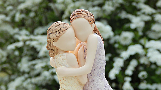 two girls ceramic statue at daytime thumbnail