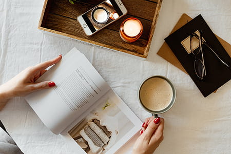 Woman read book and drink coffee thumbnail