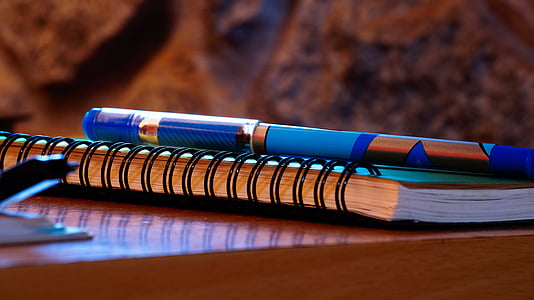 blue and orange ballpoint pen thumbnail