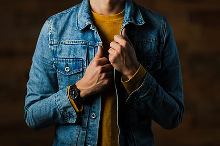 person wearing blue denim jacket thumbnail