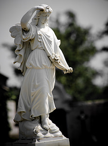 animal in white dress statuette thumbnail