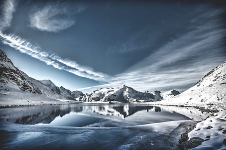 snow covered with snow under clear sky during daytime thumbnail