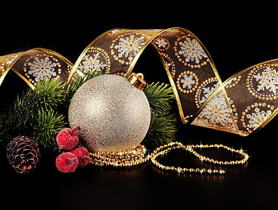 gray Christmas bauble, brown pine cone, and gold-colored ribbon thumbnail