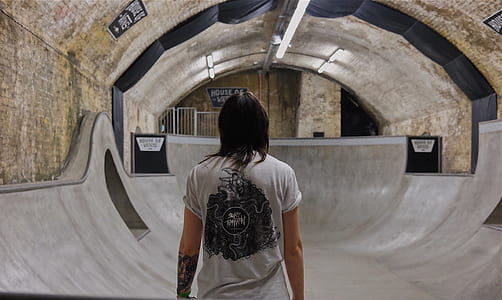 man standing in skateboard bowl thumbnail