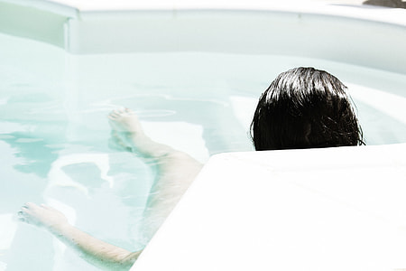 woman lying down on Jacuzzi thumbnail