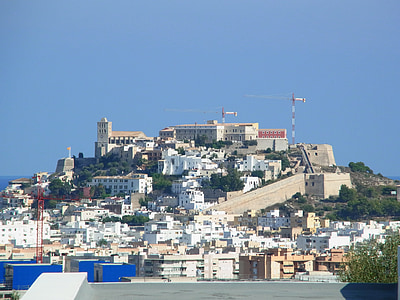 white and gray concrete buildings during daytime thumbnail