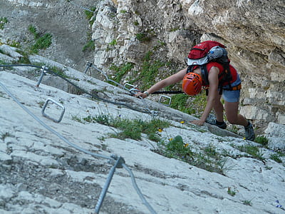 person climbing on mountain thumbnail