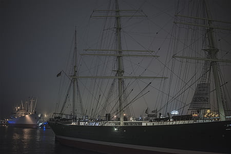 black ship on sea thumbnail