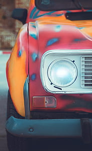 selective focus of vehicle headlight turned on thumbnail