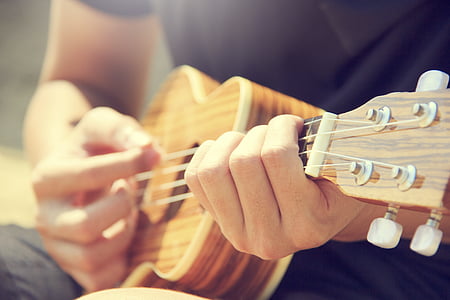 person playing ukulele thumbnail