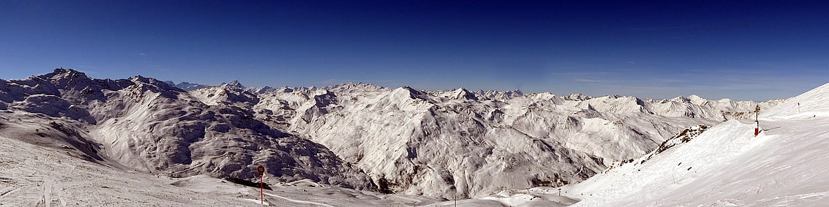 panoramic photography of snow-covered mountains thumbnail