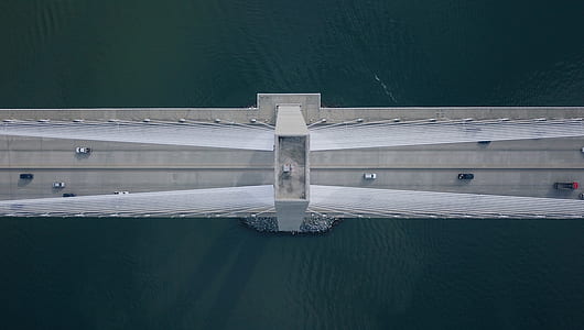 aerial view of bridge on body of water thumbnail