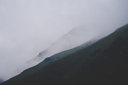 black mountain top of white clouds thumbnail
