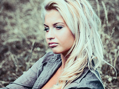 portrait photography of blonde woman in gray jacket thumbnail