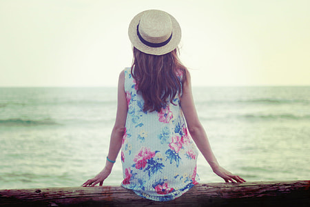 photo of woman wearing white and pink floral dress thumbnail