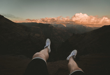 person wearing white lace-up high-tops thumbnail