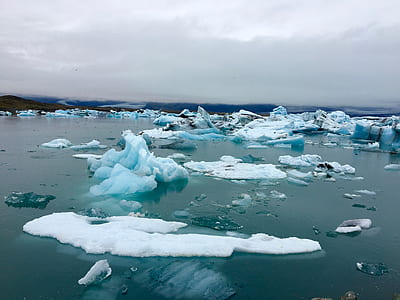 landscape photography of body of water with ice thumbnail