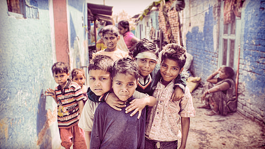group of children beside house thumbnail