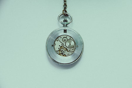 silver-colored pocket watch thumbnail