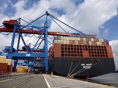 worms eye view photography of cargo ship thumbnail