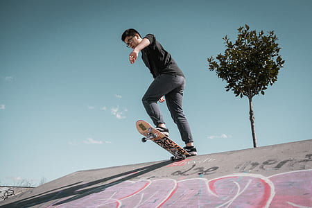 man rides on skateboard thumbnail