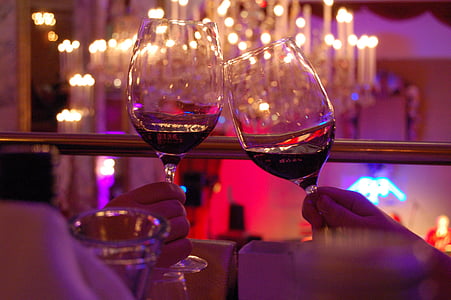 clear wine glasses with red liquid inside thumbnail