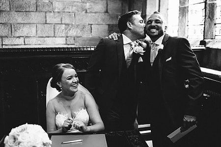 grayscale photo of bride beside groom thumbnail