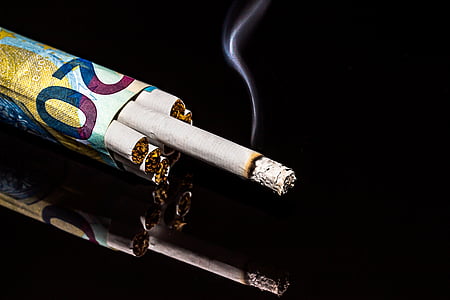 cigarettes and banknote thumbnail