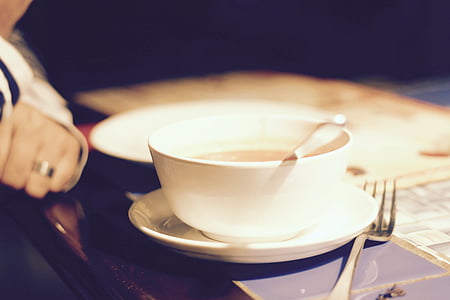 shallow focus photo white ceramic mug on saucer thumbnail